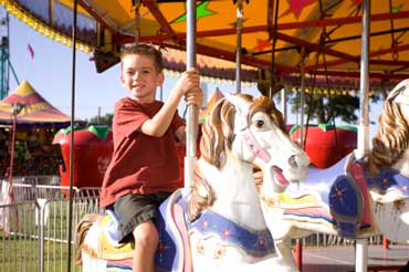 Boy on Merry-Go-Round