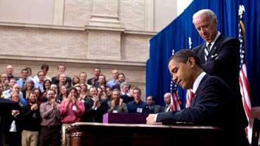 President Barack Obama Signs a Bill