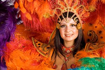 Woman Wearing Mardi Gras Costume with Feathers