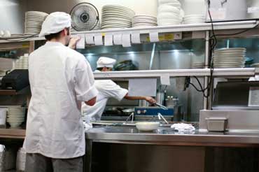 Cooks Preparing Food