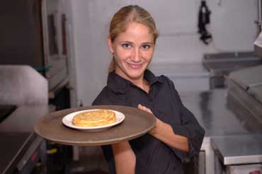 Waitress Serving Pancakes