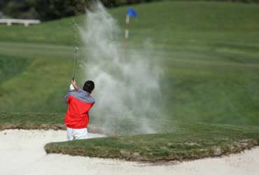 Man Playing Golf