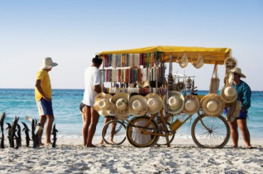 Beach Vendor Selling Souvenirs